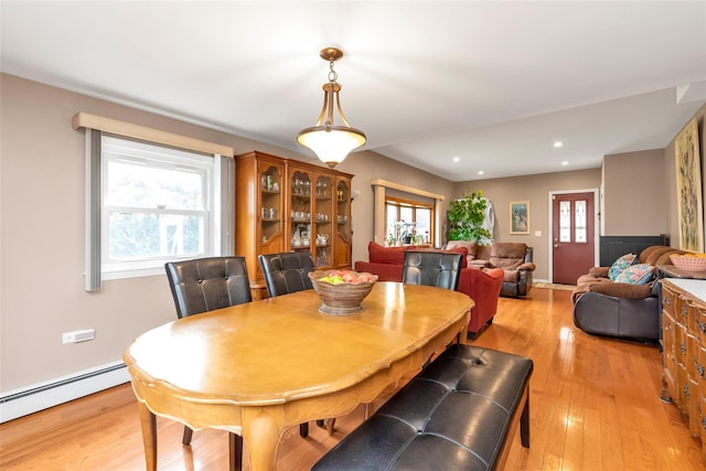 102 Spruce Ln, Valley Stream, NY 11581 - dining space with a baseboard radiator, light wood-style floors, and recessed lighting