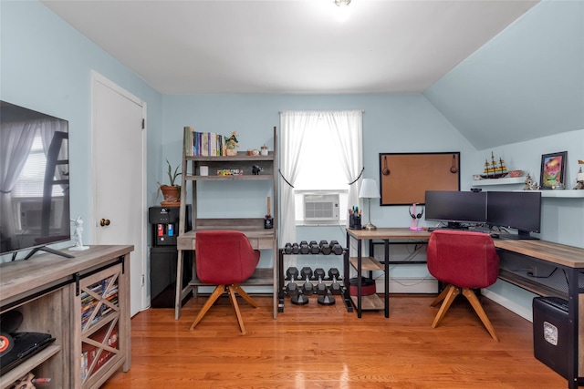 102 Spruce Ln, Valley Stream, NY 11581 - office space featuring light wood-style flooring, cooling unit, and vaulted ceiling