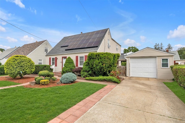 102 Spruce Ln, Valley Stream, NY 11581 - view of front of property featuring solar panels, roof with shingles, driveway, and a garage