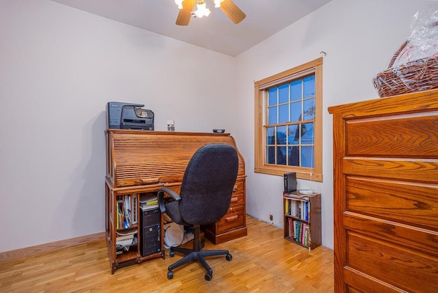 home office featuring a ceiling fan and wood finished floors
