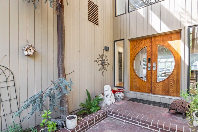 doorway to property featuring french doors