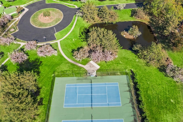 bird's eye view with a water view