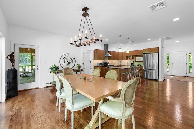240 Brady Rd, Warwick, NY 10990 - dining space with plenty of natural light, dark wood finished floors, recessed lighting, and a baseboard heating unit