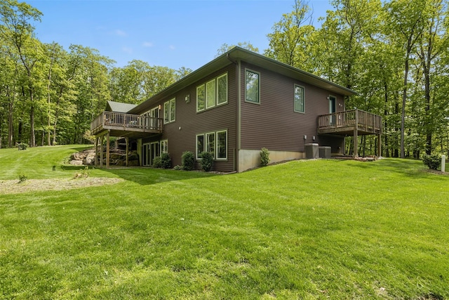 240 Brady Rd, Warwick, NY 10990 - rear view of house featuring a wooden deck, a yard, and central air condition unit