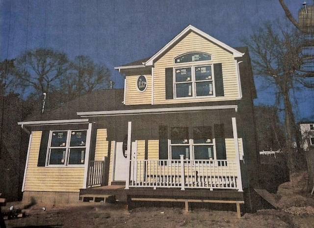 N/C Robinson Dr, Shirley, NY 11967 - traditional-style home with a porch