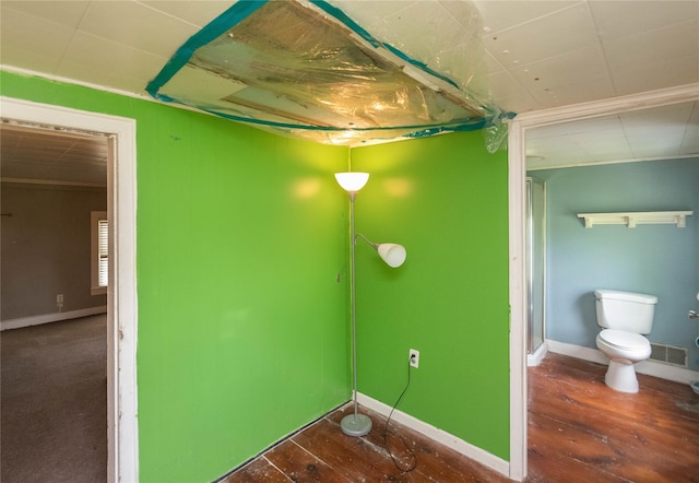 1603 Goshen Tpke, Middletown, NY 10941 - bathroom with wood-type flooring, toilet, and baseboards