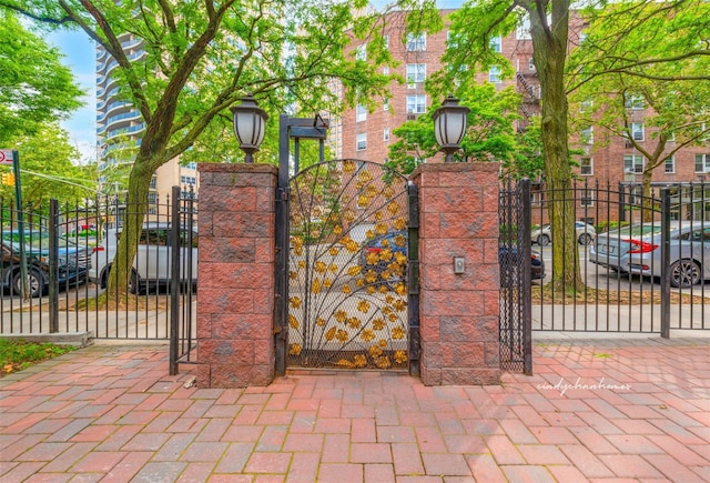 view of gate with fence private yard