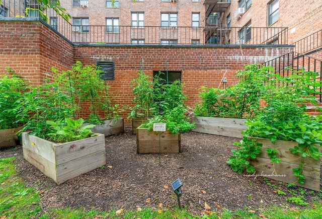 exterior space with a vegetable garden