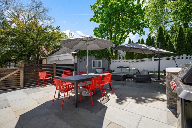 view of patio / terrace featuring an outdoor living space, a fenced backyard, and outdoor dining area