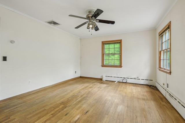 54 Cedar St, Stony Brook, NY 11790 - empty room with light wood-style flooring, a baseboard radiator, crown molding, a ceiling fan, and baseboards