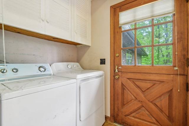 54 Cedar St, Stony Brook, NY 11790 - laundry room with cabinet space and independent washer and dryer