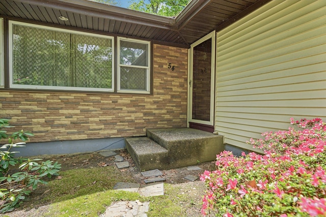 54 Cedar St, Stony Brook, NY 11790 - doorway to property with brick siding