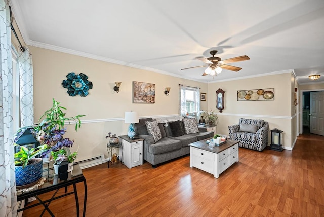 133 Parkwood Dr, Shirley, NY 11967 - living area with light wood-style floors, ceiling fan, ornamental molding, and baseboard heating