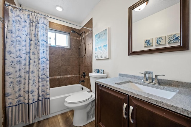 133 Parkwood Dr, Shirley, NY 11967 - bathroom with toilet, vanity, shower / bath combo, and wood finished floors