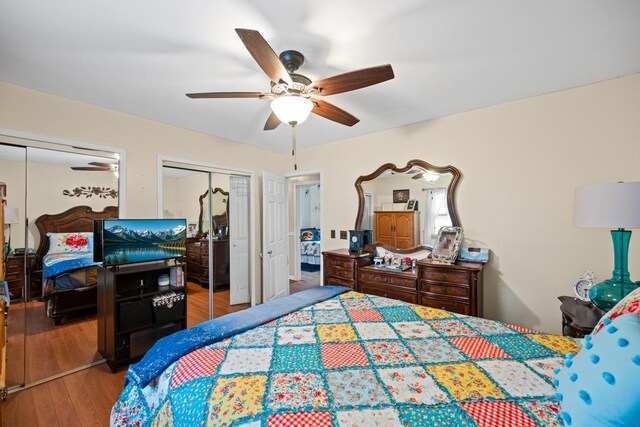 133 Parkwood Dr, Shirley, NY 11967 - bedroom featuring ceiling fan, wood finished floors, and multiple closets