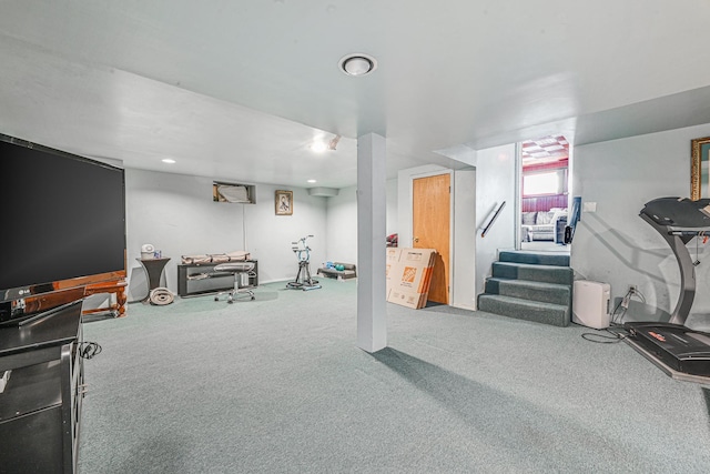 workout area featuring carpet flooring and recessed lighting