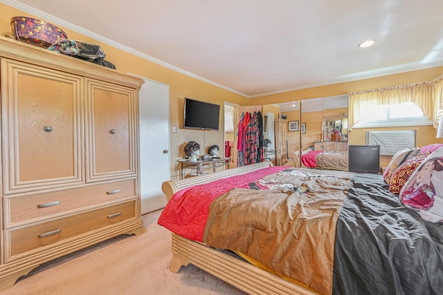 bedroom with crown molding and light colored carpet