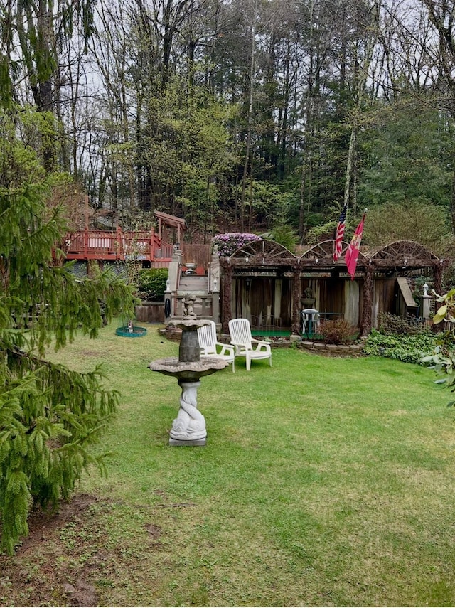 view of yard featuring a deck