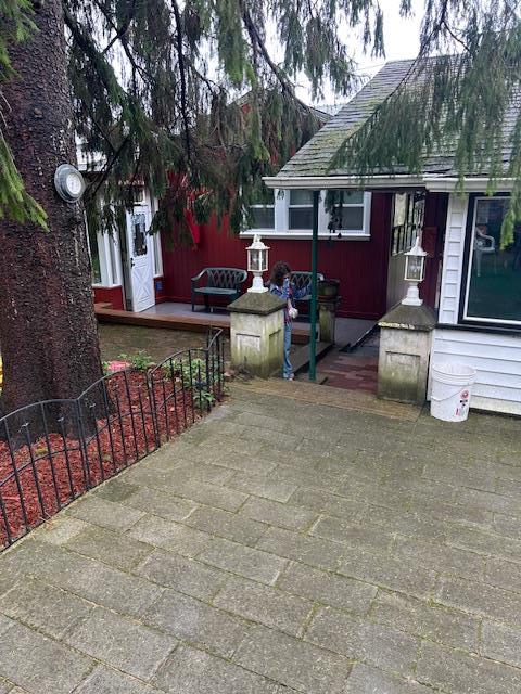view of patio / terrace with fence and entry steps