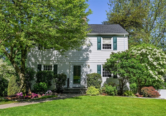 97 Highview Ave, Tuckahoe, NY 10707 - colonial-style house featuring a front yard and roof with shingles