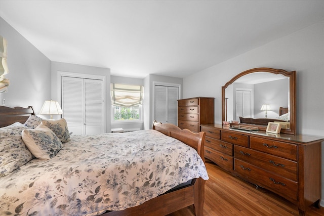 97 Highview Ave, Tuckahoe, NY 10707 - bedroom featuring multiple closets and wood finished floors