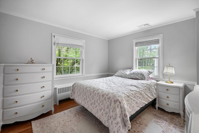 97 Highview Ave, Tuckahoe, NY 10707 - bedroom featuring radiator, crown molding, and dark wood-type flooring