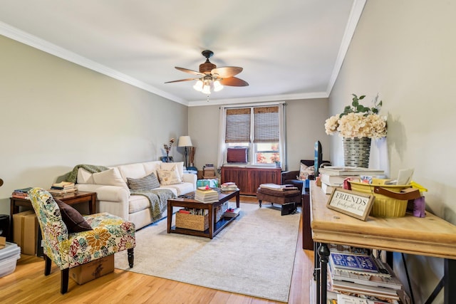 200 N Village Ave Unit D10, Rockville Centre, NY 11570 - living area featuring ceiling fan, ornamental molding, and wood finished floors