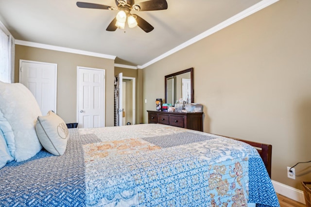200 N Village Ave Unit D10, Rockville Centre, NY 11570 - bedroom featuring ornamental molding, wood finished floors, baseboards, a ceiling fan, and vaulted ceiling
