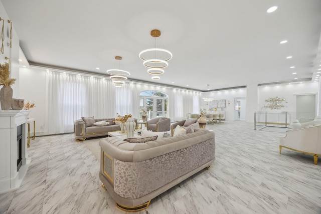living area with recessed lighting and a fireplace