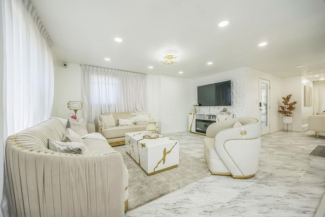 living room with recessed lighting and marble finish floor