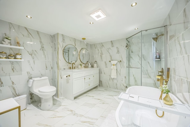 bathroom with vanity, toilet, a marble finish shower, recessed lighting, and tile walls