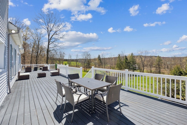 wooden deck with outdoor lounge area and outdoor dining area