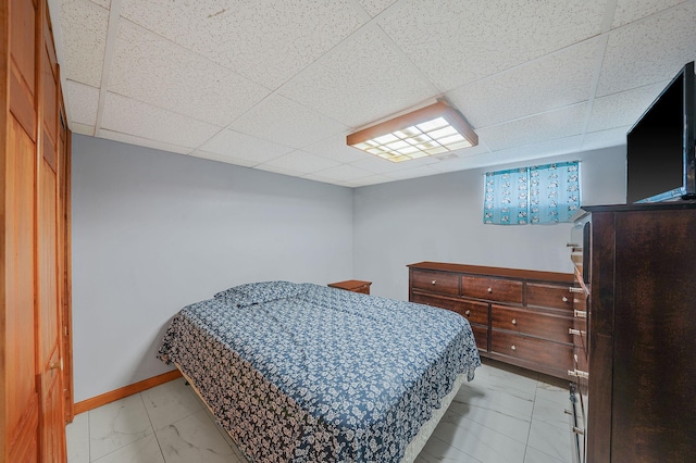 1036 Pacific St, Baldwin Harbor, NY 11510 - bedroom with baseboards and a drop ceiling