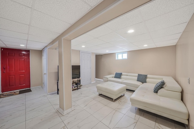 1036 Pacific St, Baldwin Harbor, NY 11510 - living area featuring recessed lighting, marble finish floor, and a drop ceiling
