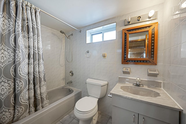 1036 Pacific St, Baldwin Harbor, NY 11510 - full bath with shower / bath combo, vanity, toilet, tile patterned floors, and tile walls