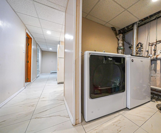 1036 Pacific St, Baldwin Harbor, NY 11510 - washroom with laundry area, baseboards, marble finish floor, recessed lighting, and washer and clothes dryer