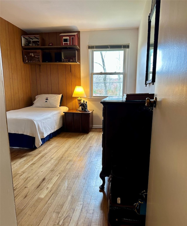 bedroom with wood-type flooring
