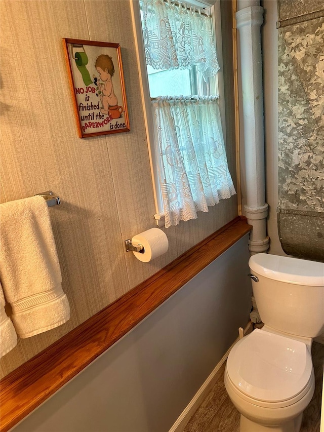 bathroom featuring toilet