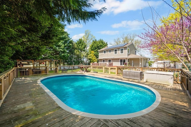 view of pool featuring a deck