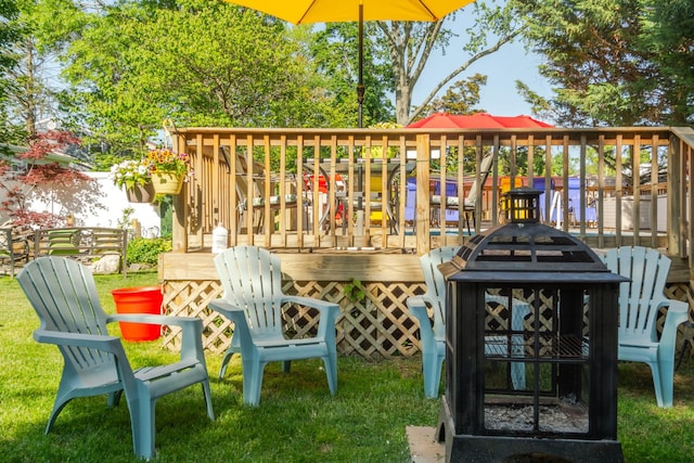 exterior space with a lawn and a deck