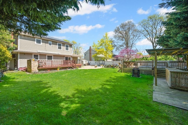 view of yard with a wooden deck