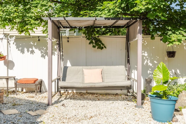 view of patio / terrace featuring fence