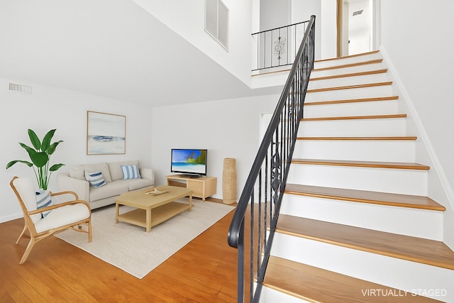 60 School St, Hampton Bays, NY 11946 - stairway with wood finished floors