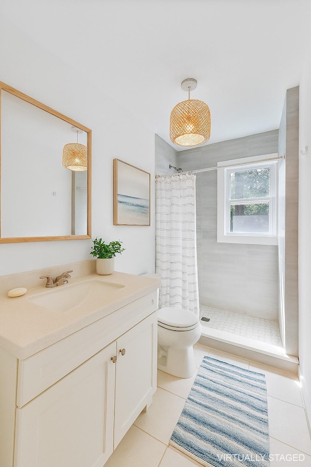 60 School St, Hampton Bays, NY 11946 - full bathroom with a stall shower, tile patterned floors, and vanity