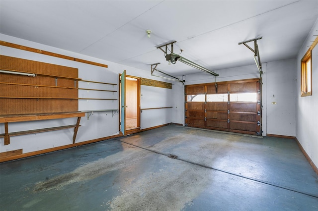garage featuring baseboards