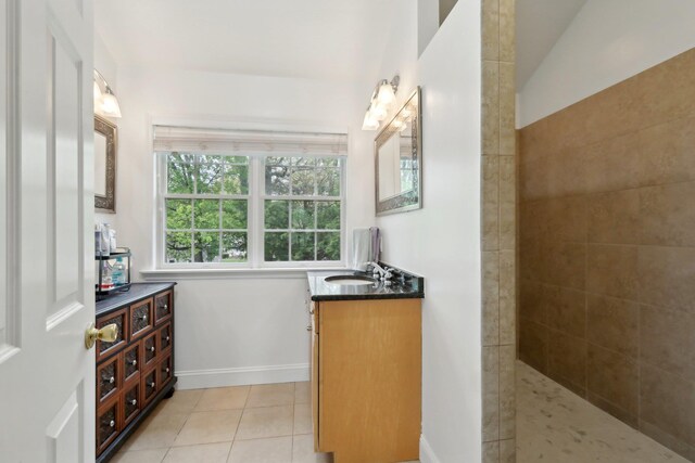 27 Lindbergh Ln, New City, NY 10956 - full bath with vanity, baseboards, tile patterned flooring, and a tile shower