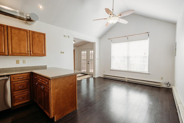 kitchen with a baseboard heating unit, ceiling fan, a peninsula, baseboard heating, and french doors