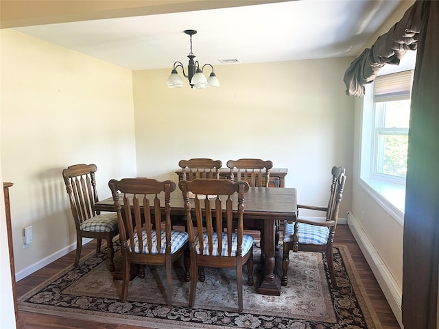 19 Millbrook Dr, Stony Brook, NY 11790 - dining space featuring baseboards, dark wood-type flooring, and a chandelier