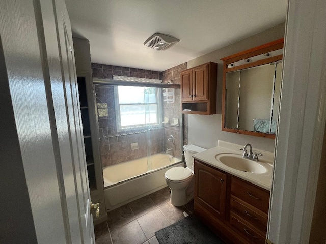 19 Millbrook Dr, Stony Brook, NY 11790 - bathroom with toilet, combined bath / shower with glass door, tile patterned flooring, and vanity
