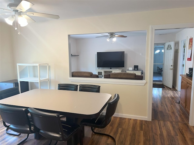 19 Millbrook Dr, Stony Brook, NY 11790 - dining area with baseboards, a ceiling fan, and dark wood finished floors
